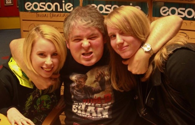 Irish author Darren Shan and two fans
